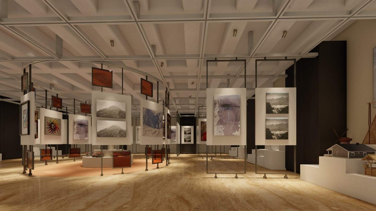 Freestanding frames continue the display through the hall