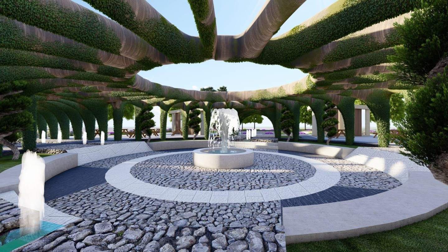 Under the canopy: the central fountain and cobbled plaza