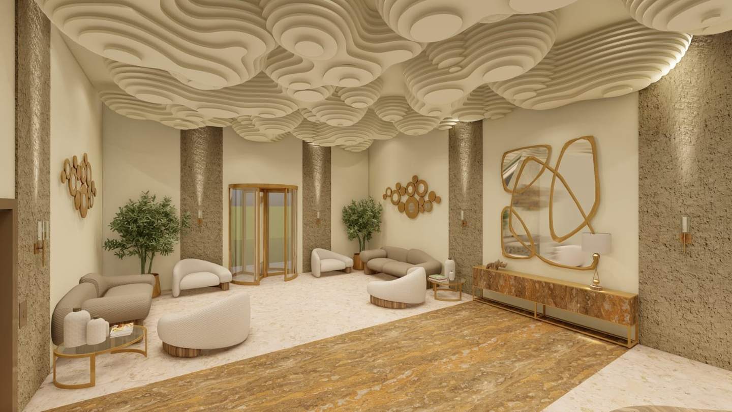 Looking back to the entrance: the revolving door, the lounges and the stone runner
